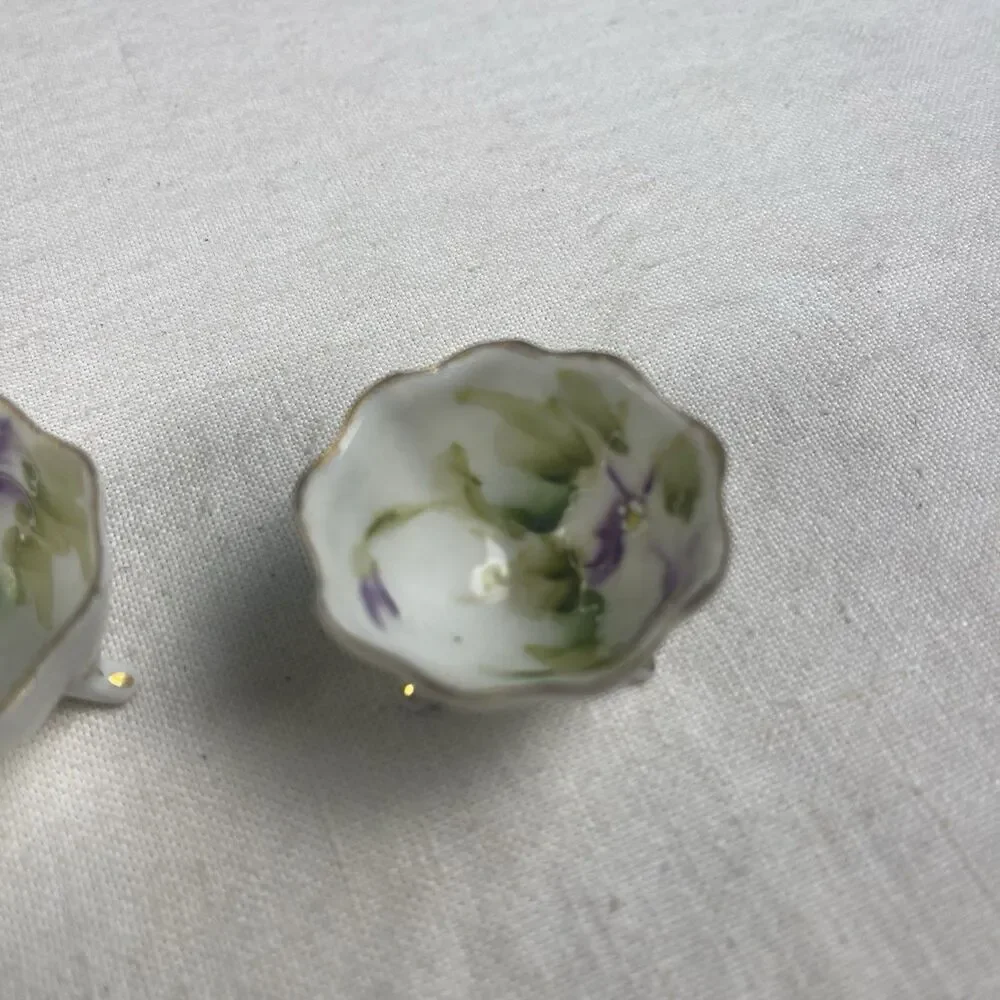 PAIR HAND PAINTED  SALT CELLAR DIPS-LAVENDER FLOWERS - GREEN-GOLD TRIM - FOOTED